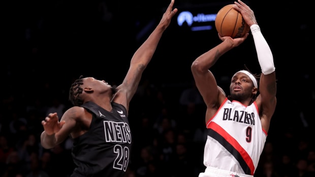Portland Trail Blazers forward Jerami Grant (9) takes a shot against Brooklyn Nets forward Dorian Finney-Smith (28)
